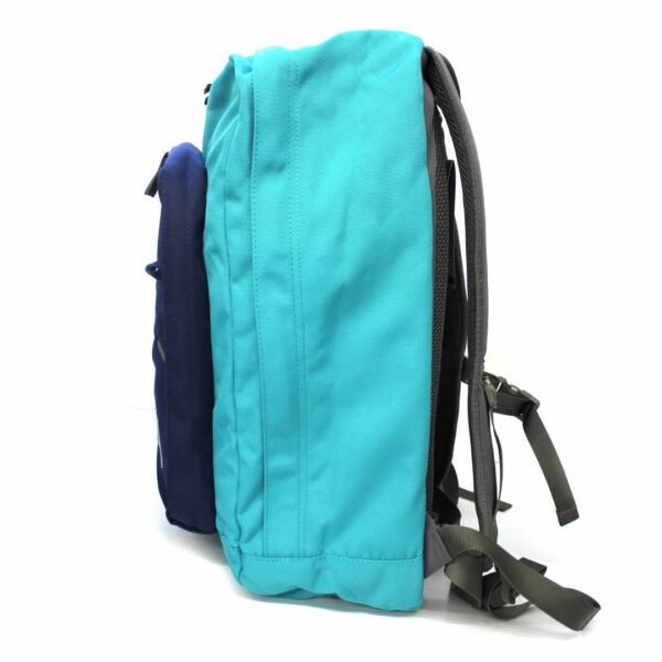 sac à dos marine et turquoise de marque Mrick pour l'école, 31 litres.